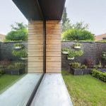 Aanbouw verbindt huis en tuin Sint-Katelijne-Waver InterieurKabinet